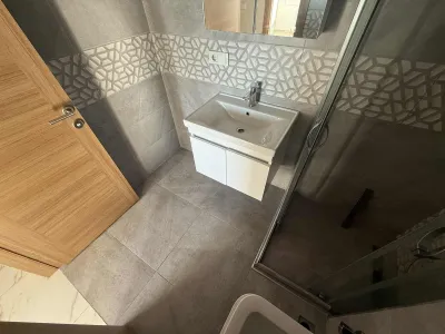 PANORAMİK DENİZ MANZARALI BALKONLU BAKIMLI GENİŞ E.BANYOLU 2+1 — fotoğraf 10