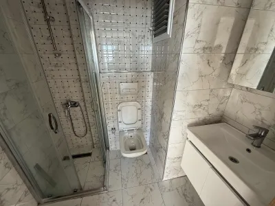 PANORAMİK DENİZ MANZARALI BALKONLU BAKIMLI GENİŞ E.BANYOLU 2+1 — fotoğraf 20